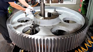 process of precision processing giant metal gear wheel with sophistication of technology.