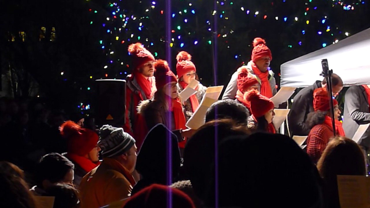 Villagers gather at Gramercy Park in NYC to sing Carols on Christmas