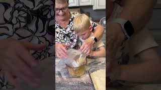 Making my famous chicken and rice casserole with the help of my 4 year old great grandson