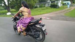 Bike riding wearing Nivedita Basu style saree/bike riding by woman
