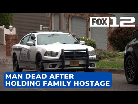 Authorities shoot, kill man holding family hostage in Happy Valley