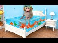Monkey baby bon bon goes fishing and swims with ducklings in the pool
