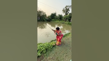 Beautiful lady fisherman catching catfishing in village big pond  #bass #fish #villagelife #fishing