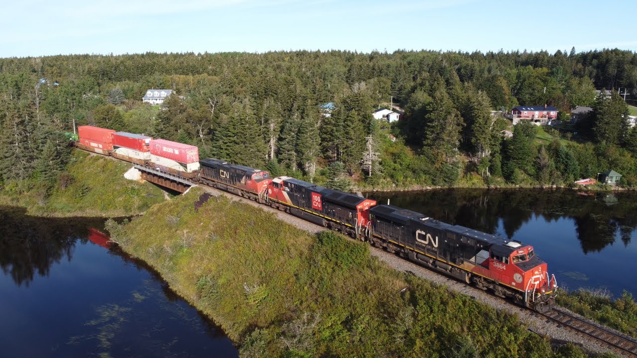 Awesome 4K Aerial view! Stack Train CN 120 w/CN 100 Unit at Palmers Pond near Dorchester, NB