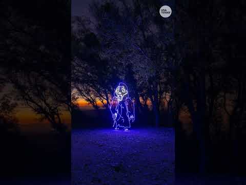 Watch light artist 'paint' spooky Halloween animations that come alive at night