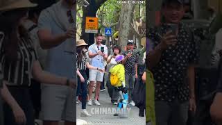 Robots join citywalk in Shanghai