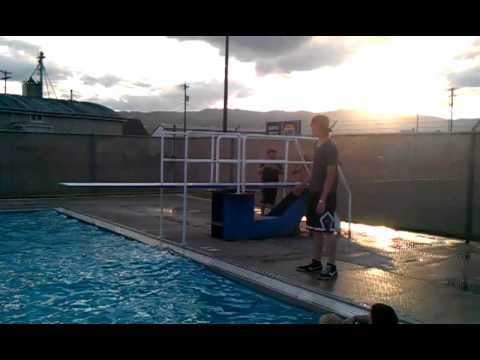 Flips off diving board - YouTube