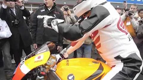 Honda CEO Takanobu Ito rides MotoGP bike