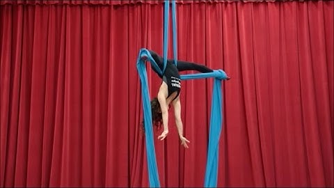 Chair Entry into Cross Back Straddle with Aerial Physique