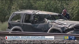 Three children, mother hospitalized after being ejected from vehicle in crash
