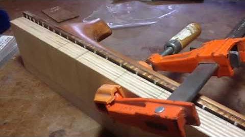 Installing side markers on the fretboard