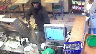 Surveillance video captures armed robbery of Miami Subway