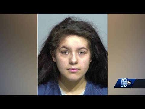 Woman accused of driving over man multiple times