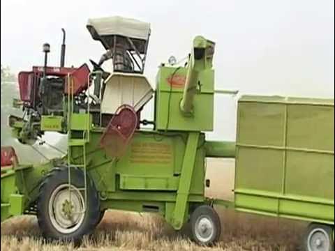 TRACTOR mounted combine harvester( POWERED GRAIN CUM STRAW COMBINE )DEMO ON WHEAT