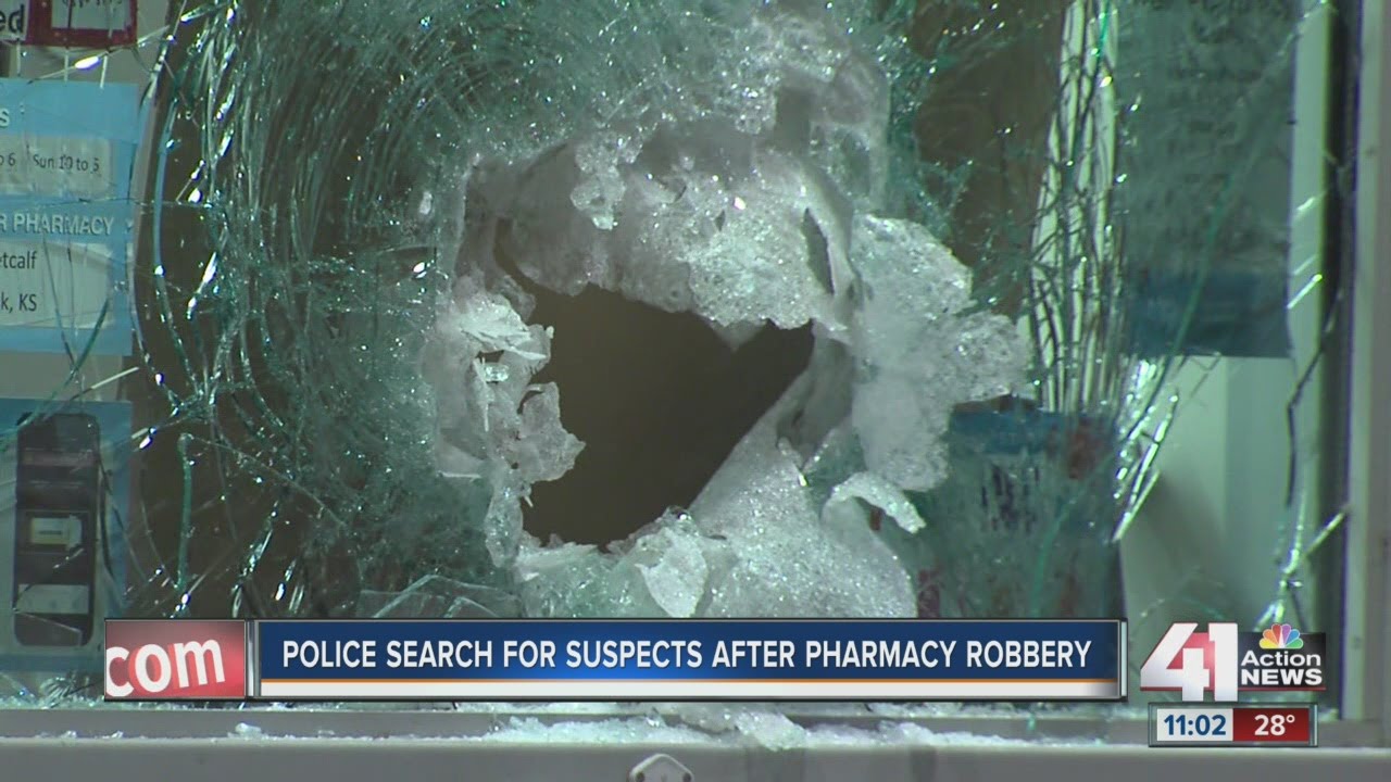 Police search for suspects after pharmacy robbery - YouTube
