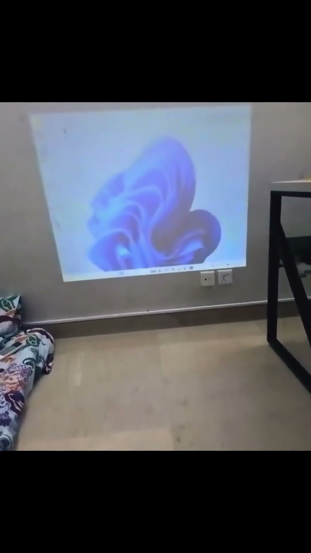 This Mini Projector Works Without a Power Outlet!