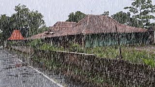 WALK IN THE MIDDLE OF HEAVY RAIN IN RURAL INDONESIAN VILLAGE