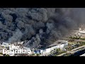 Thick black smoke from a fire at a California medical equipment warehouse
