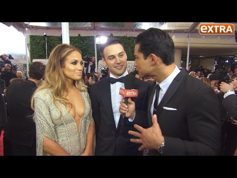 Jennifer Lopez Stuns in Silver Gown at Golden Globes, Talks 'Boy Next Door'