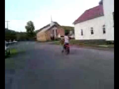 lil brother riden wheelie on crf150f