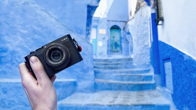 Photographer capturing Morocco's Blue City, Chefchaouen