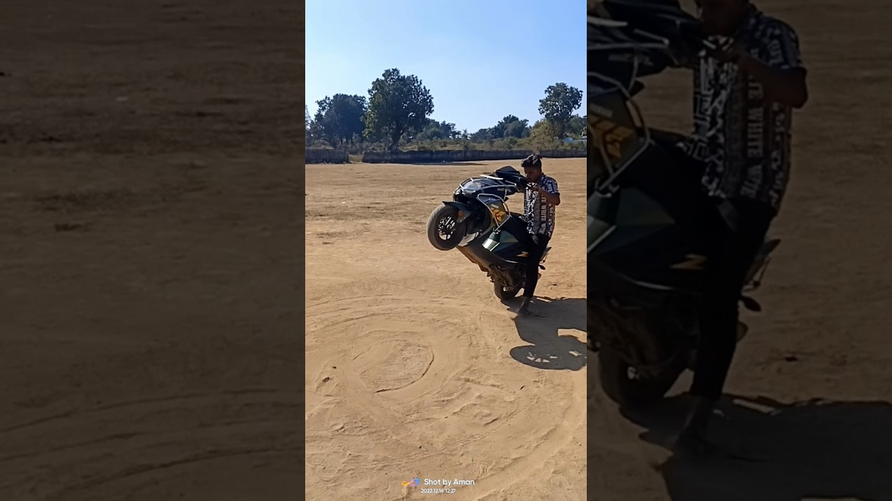 Aman Stunt Rider Wheelie on scotty