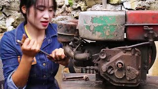 The village girl helped her uncle repair the old diesel engine