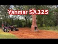 I finished grading around the old chimney with my Yanmar SA325. First time greasing my new tractor.