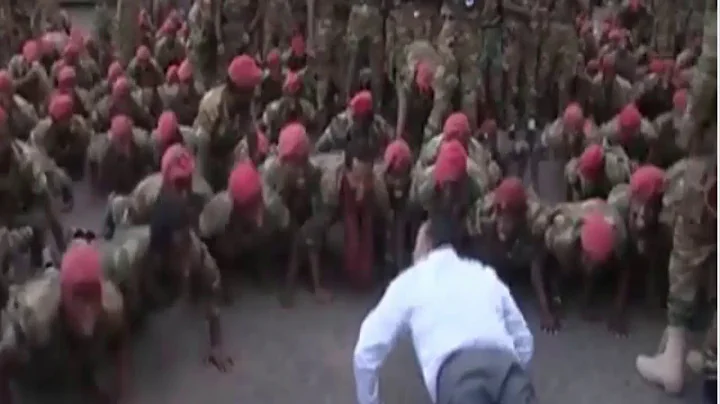 Ethiopia Prime Minister Abiy Ahmed does press-ups with protesting soldiers