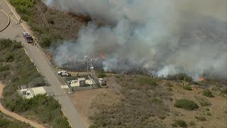 Brush fire contained after threatening homes in Oceanside, prompting evacuations