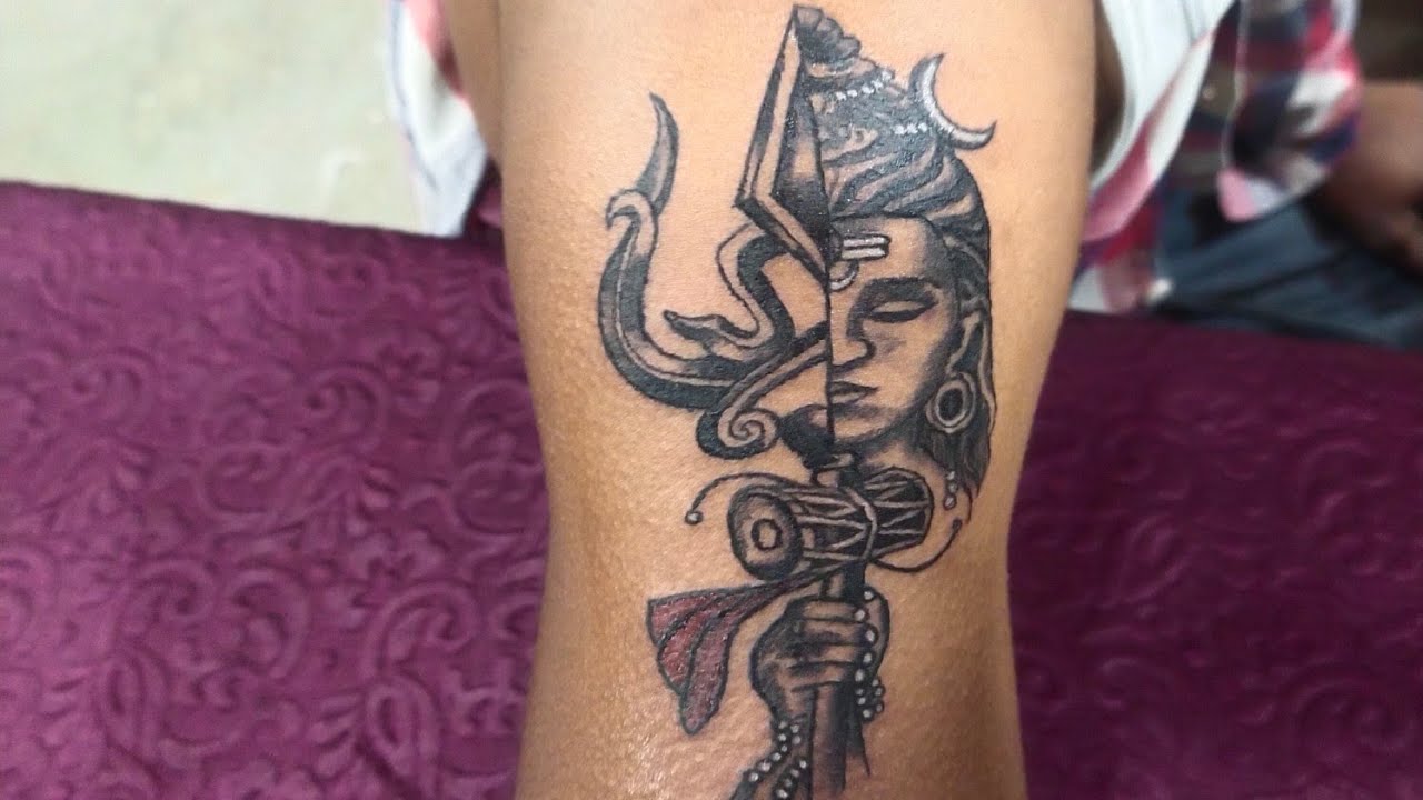 Tattoo uploaded by Gems Tattoo Studio  Shiva abstract tattoo Combination  of Om trishul and a third eye  Tattoodo