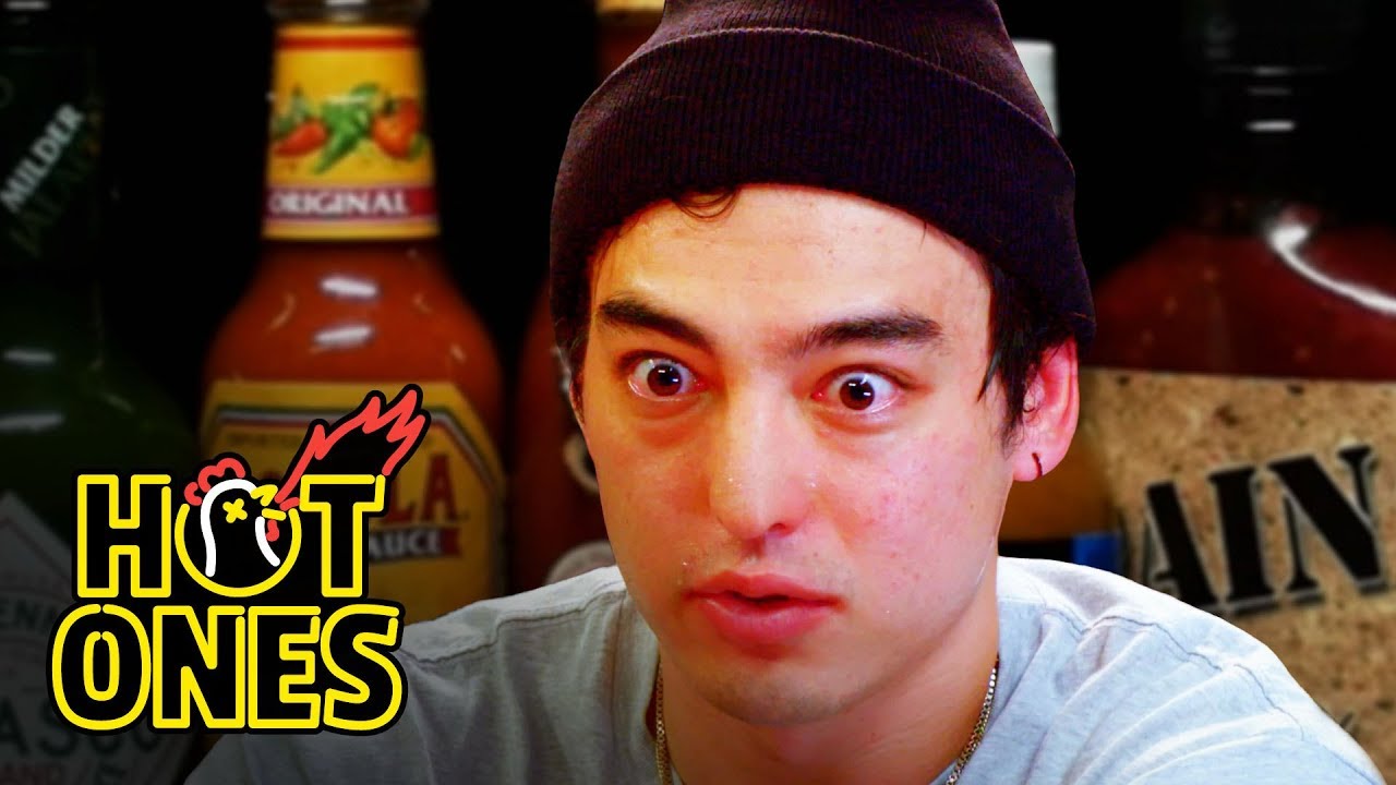Joji Sets His Face on Fire While Eating Spicy Wings | Hot Ones | First We Feast