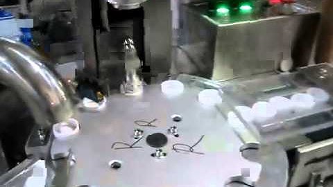 Automatic Cap  Lining machine , Wad inserting machine , Wadding machine