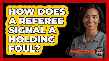 How Does A Referee Signal A Holding Foul?