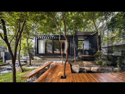black-container-house,-steel-frame-decorated-with-wooden-floor-connecting