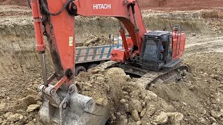 Hitachi Zaxis 670LCR Excavator Loading Mercedes & MAN Trucks