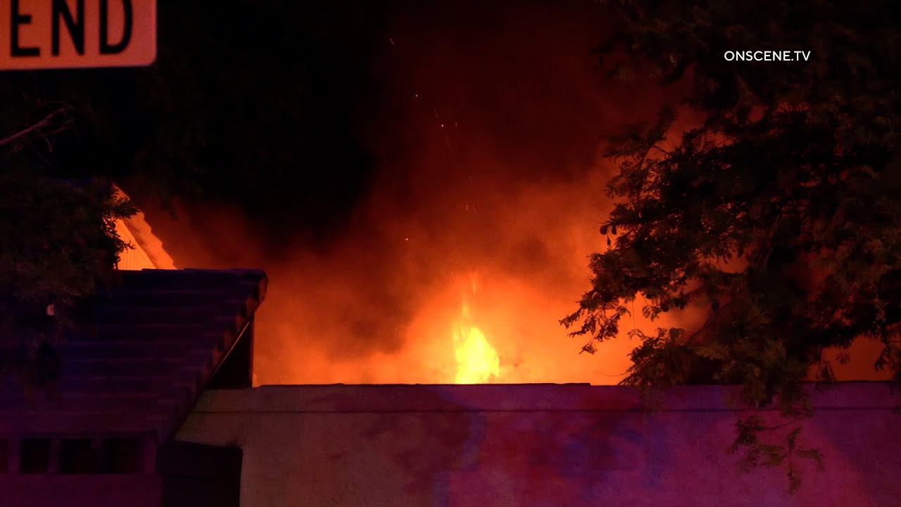 Woman Rescued From House Fire - YouTube