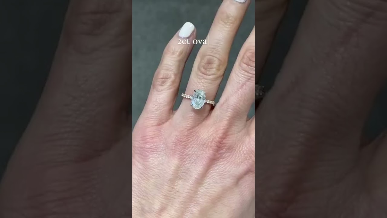 2 carat oval diamond engagement with pave set shoulders made at our hatton garden jewellers workshop