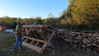 Turning slab wood into firewood for outdoor boiler #slab #firewood #chainsaw #tractor #michigan