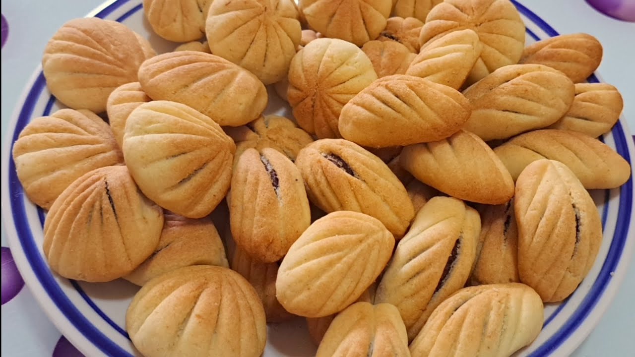 معمول العشر دقايق  هش ويذوب في الفم من غير خفق ولا قوالب التشكيل نقشه ثابته معمول فاخر من الاخر...