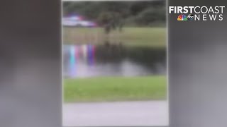 WATCH: Man detained near pond after deadly double shooting in St. Augustine