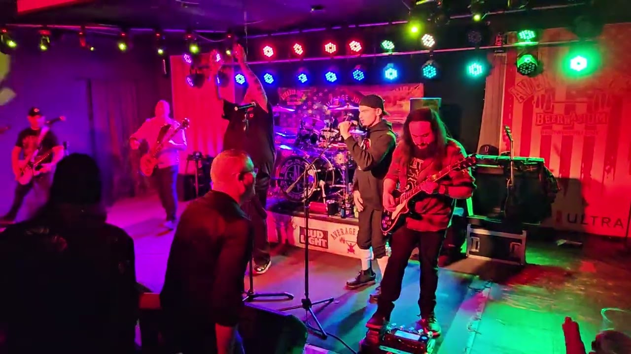 Parker sings to a crowded bar