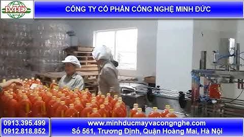 Máy chiết đóng chai tương ớt chính xác Minh Đức