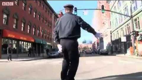 BBC News   Dancing policeman delights US drivers and pedestrians   1