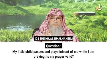 My little child passes and plays infront of me while I am praying, Is my prayer valid? Sheikh Assim