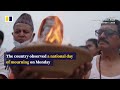 Families pray for flood victims on day of mourning in Nepal