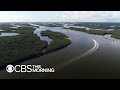 In Florida, climate change threatens Orlando's thriving oyster population