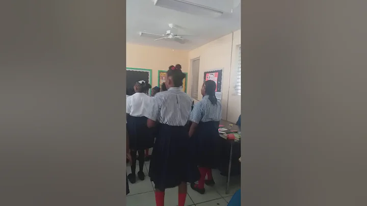 Eva Hilton practicing the song in class