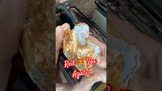 Check out the wild red bands on this funky rock!