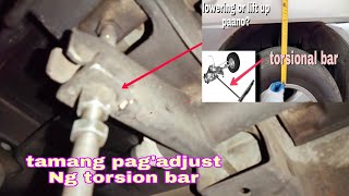 LOWERING FRONT WHEEL TORSION BAR ADJUSTMENT